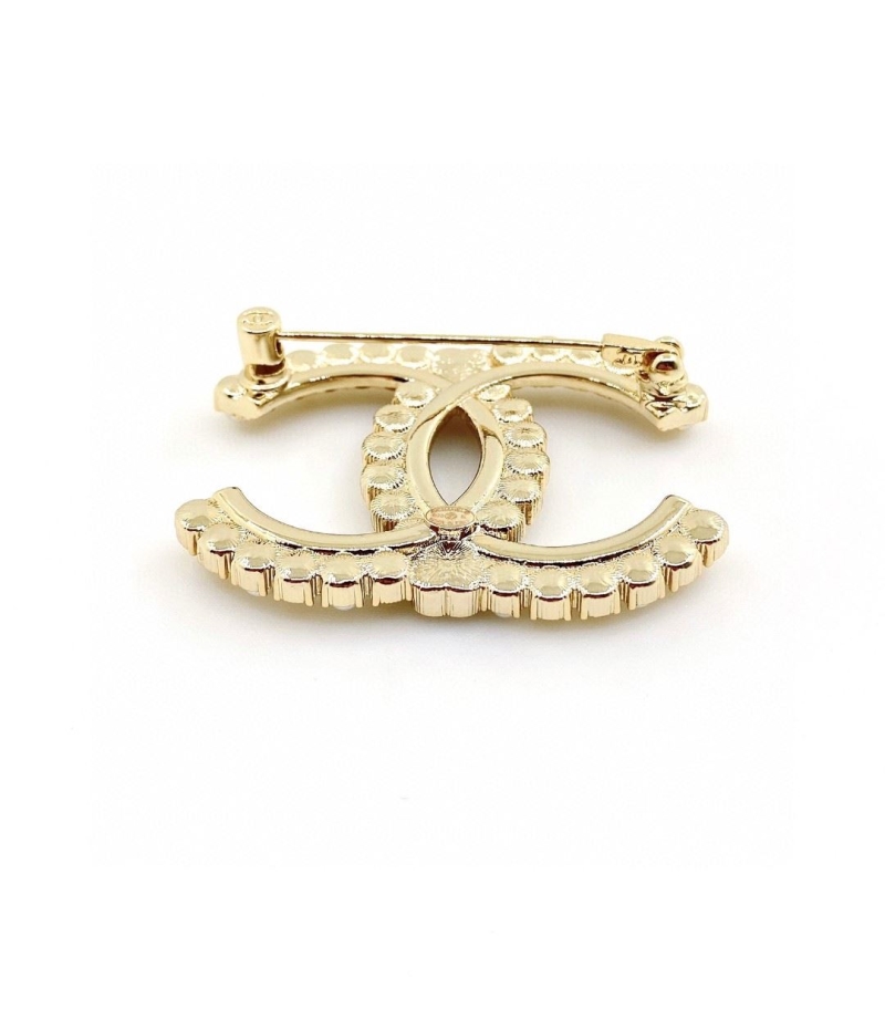 Ch**el brooches